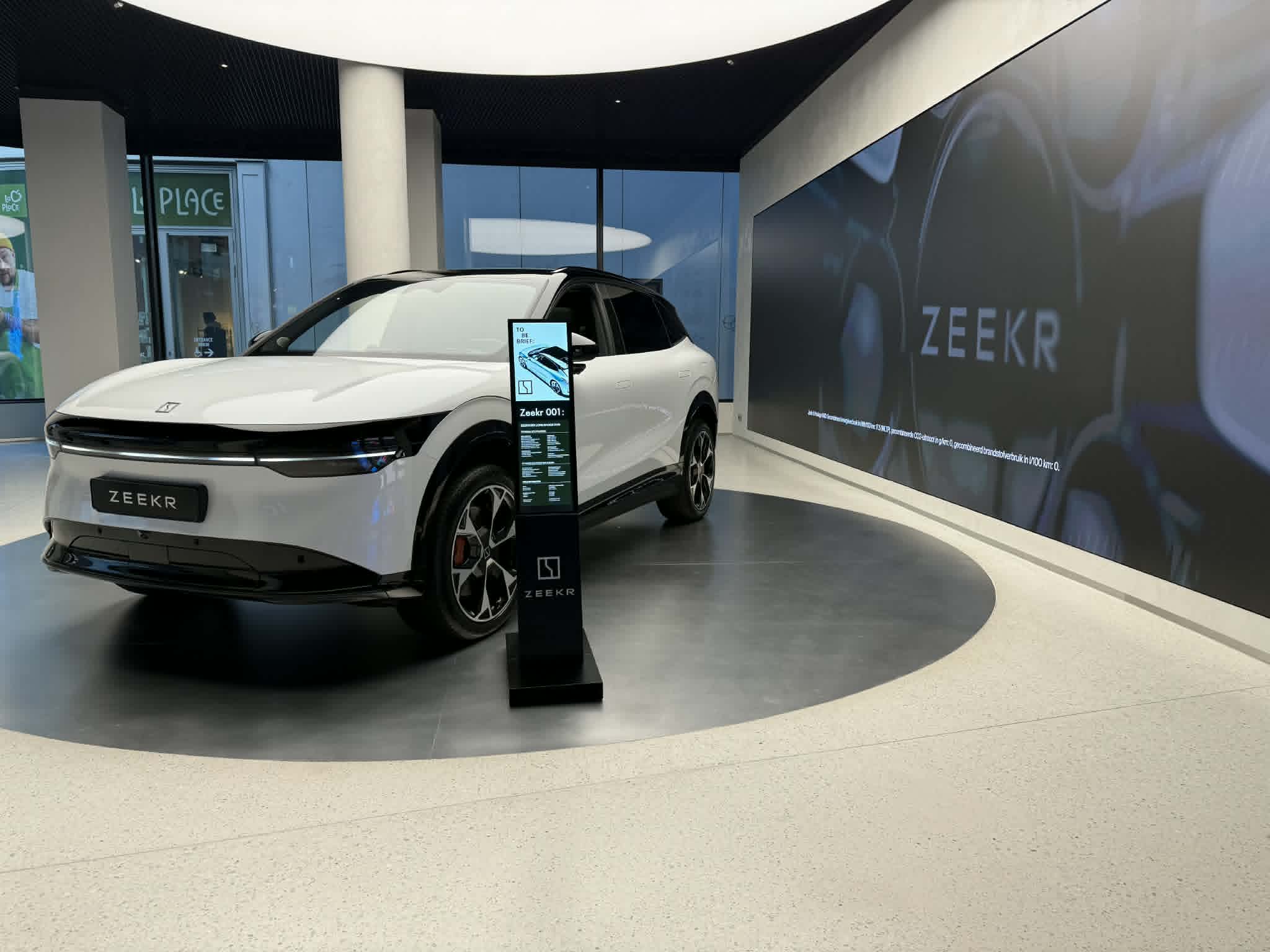 Zeekr showroom — LED totem and large-format video wall